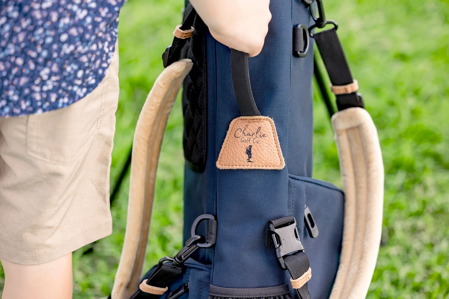 Lifestyle product photography of junior kids golf bag for Charlie Golf Co