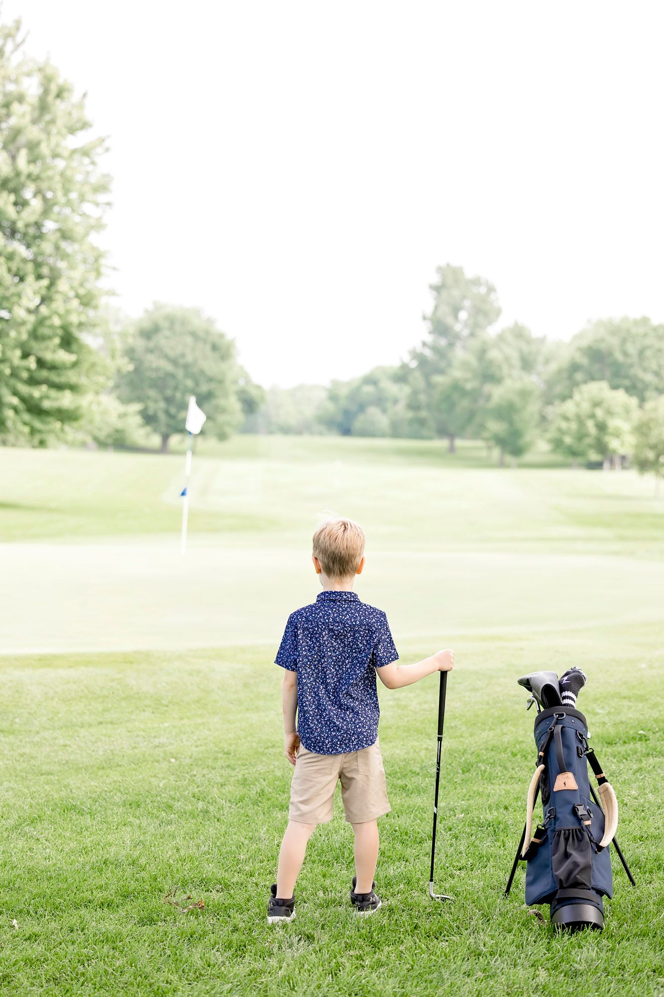Lifestyle product photography of the junior kids golf bag for Charlie Golf Co photography session