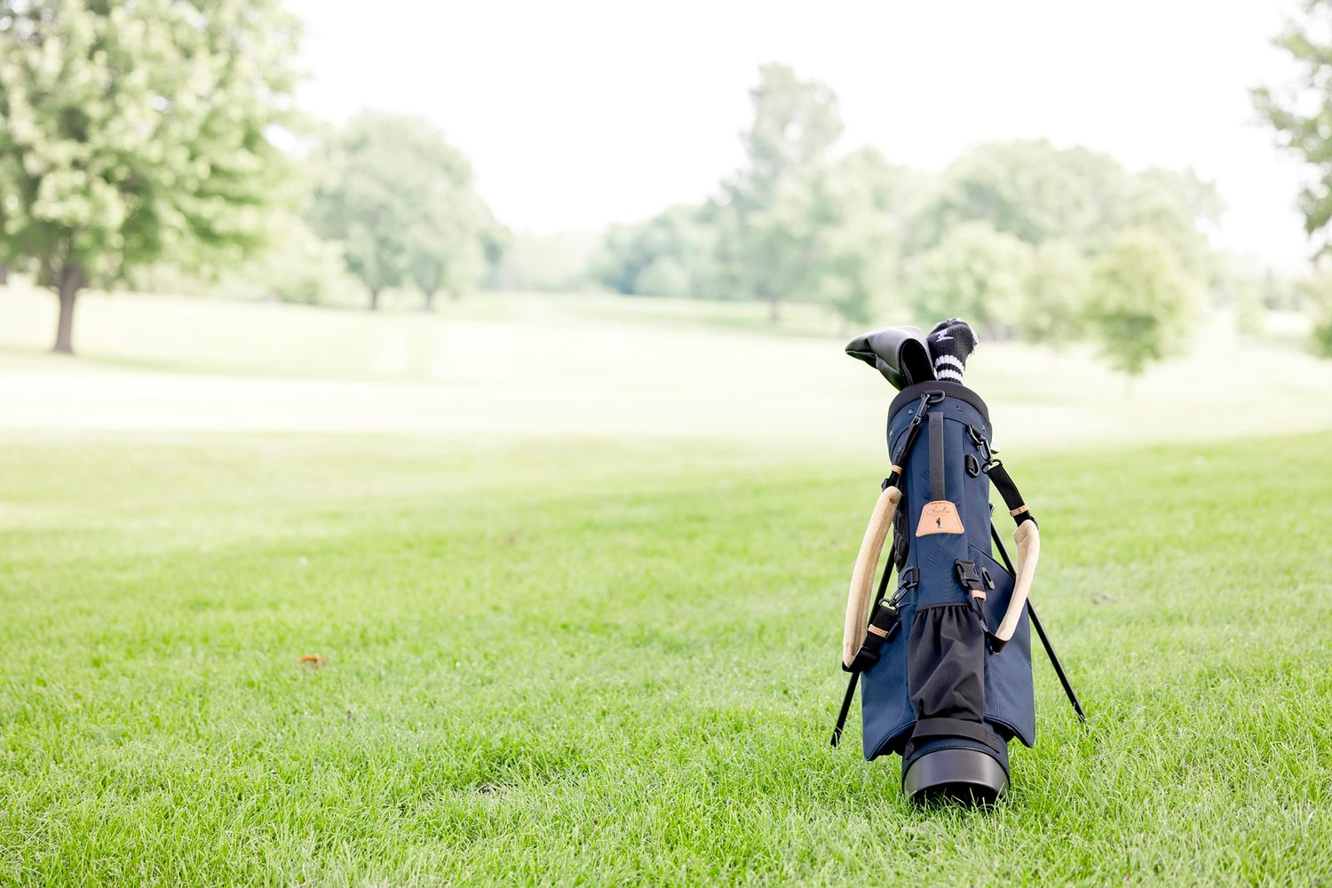 A golf bag on golf course for Charlie Golf Co in Iowa branding