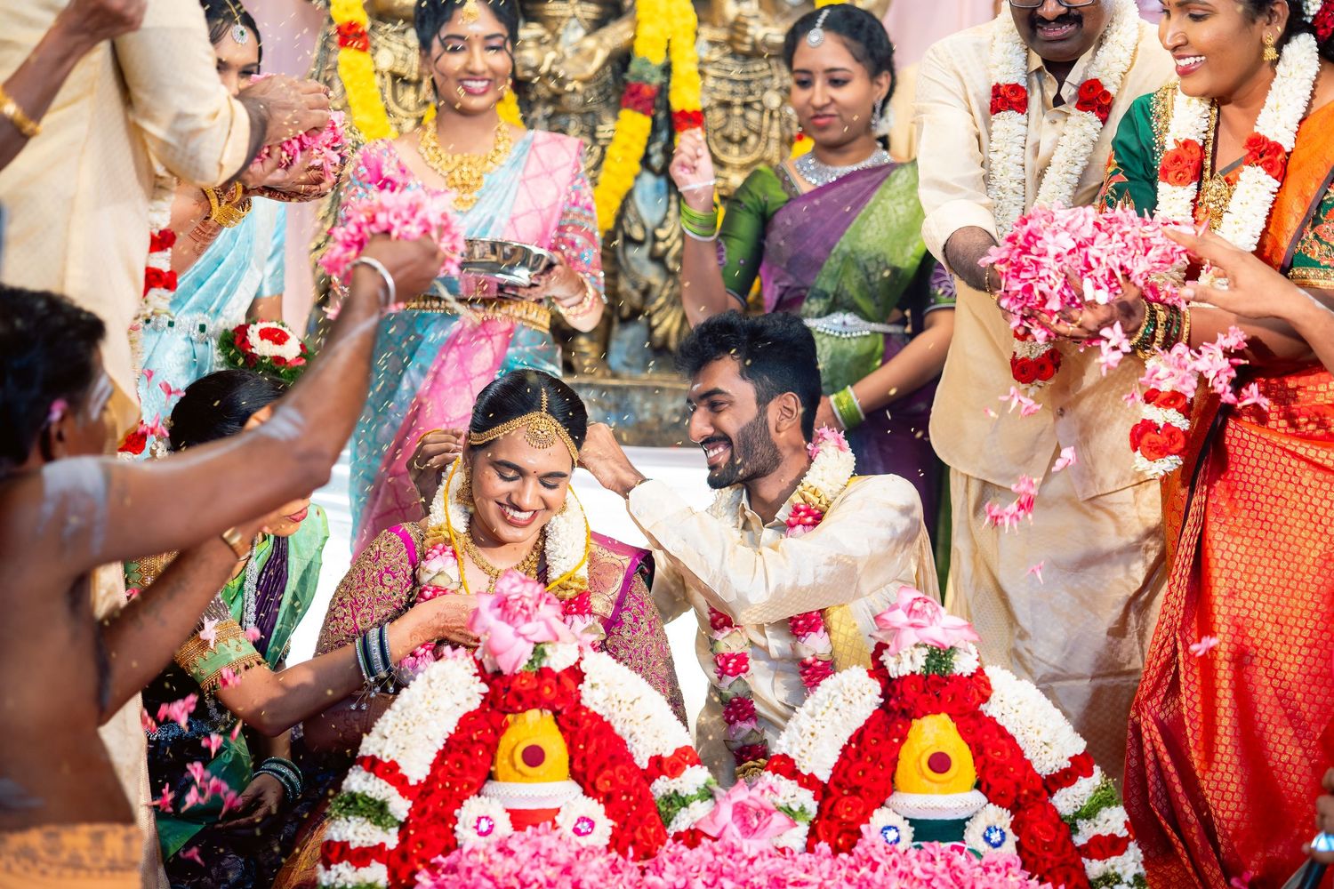 thali moment captured by Jeno Photography with flower shower and blessing