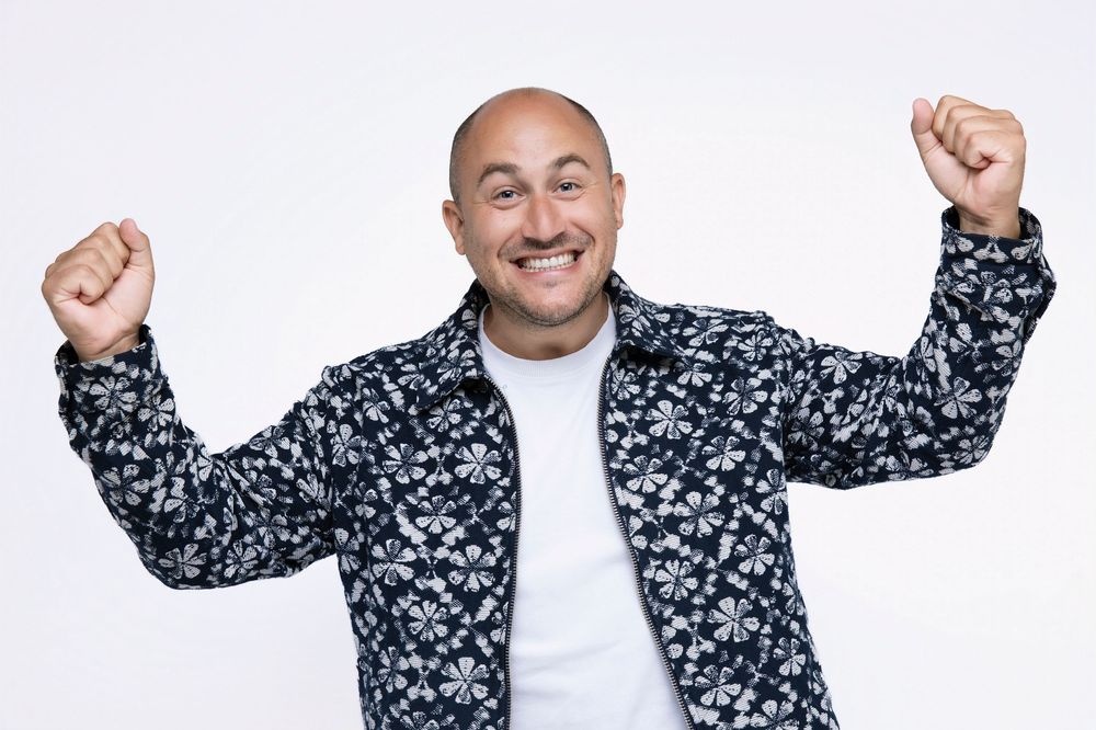 People in casual attire strike dynamic poses with raised arms against white backdrop in sequence.