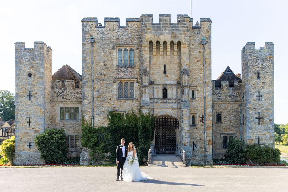 Bride and groom in front of Hever castle, Kent