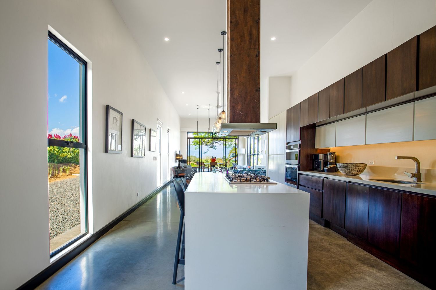 Luxurious villa with modern kitchen design elements, blending modern architecture with nature