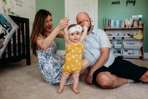 Family in baby nursery for in home family session captured by Maryland family photographer Mallory Bramlett.