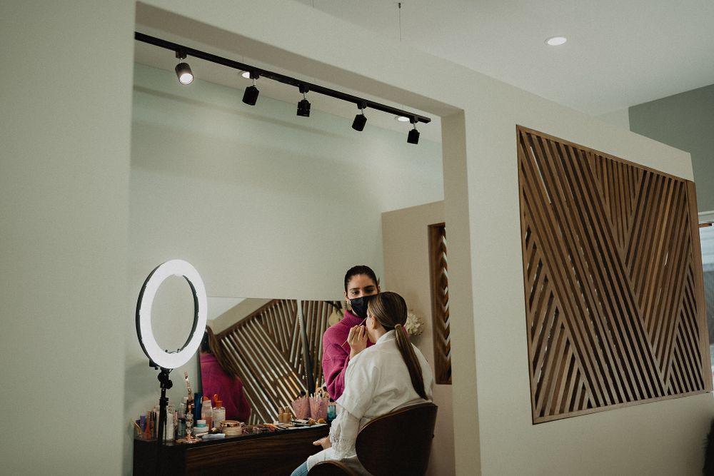Bride in the makeup chair, a beautiful artistic moment before she becomes a bride