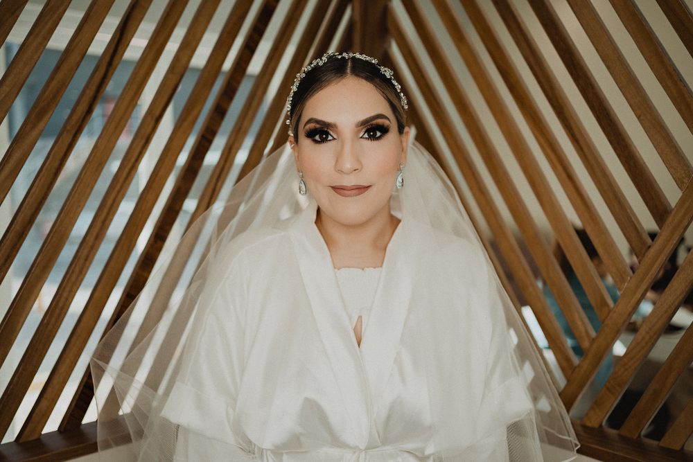 Bride looking stunning after her makeup session, ready for the wedding ceremony