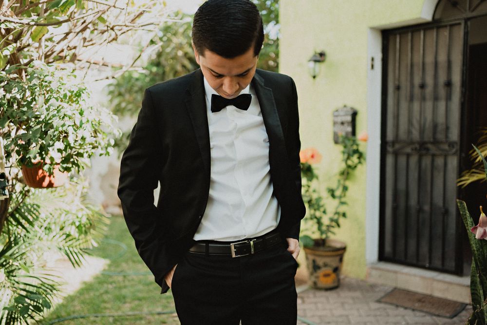 Groom dressed up and ready, showcasing his excitement before the wedding ceremony in Mazatlán
