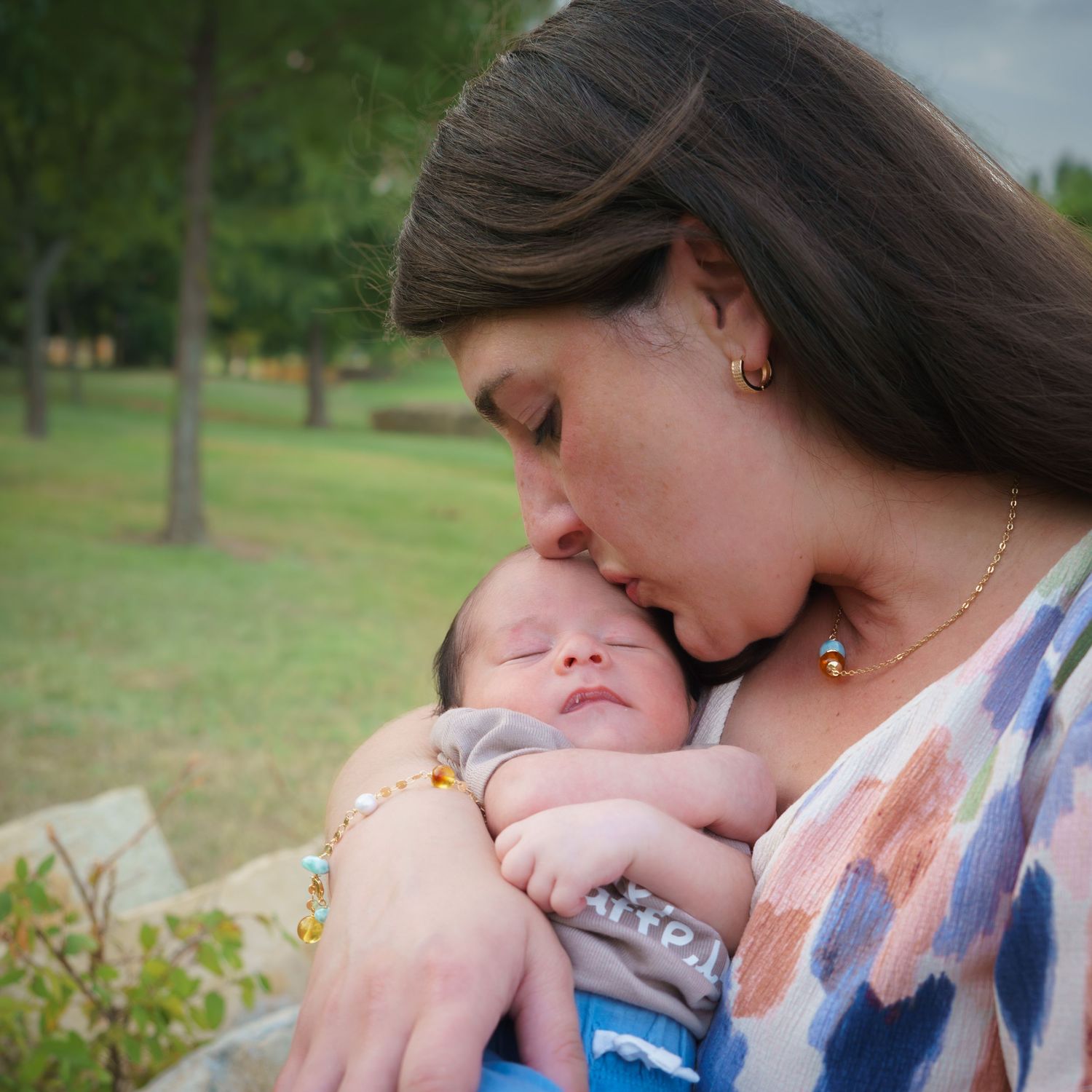 Baby boy newborn photo session extended family Keller Texas golden hour sunset big sisters Keller Town center