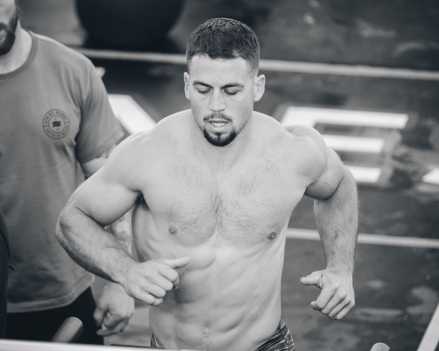 Black and white photo of athlete during intense workout.