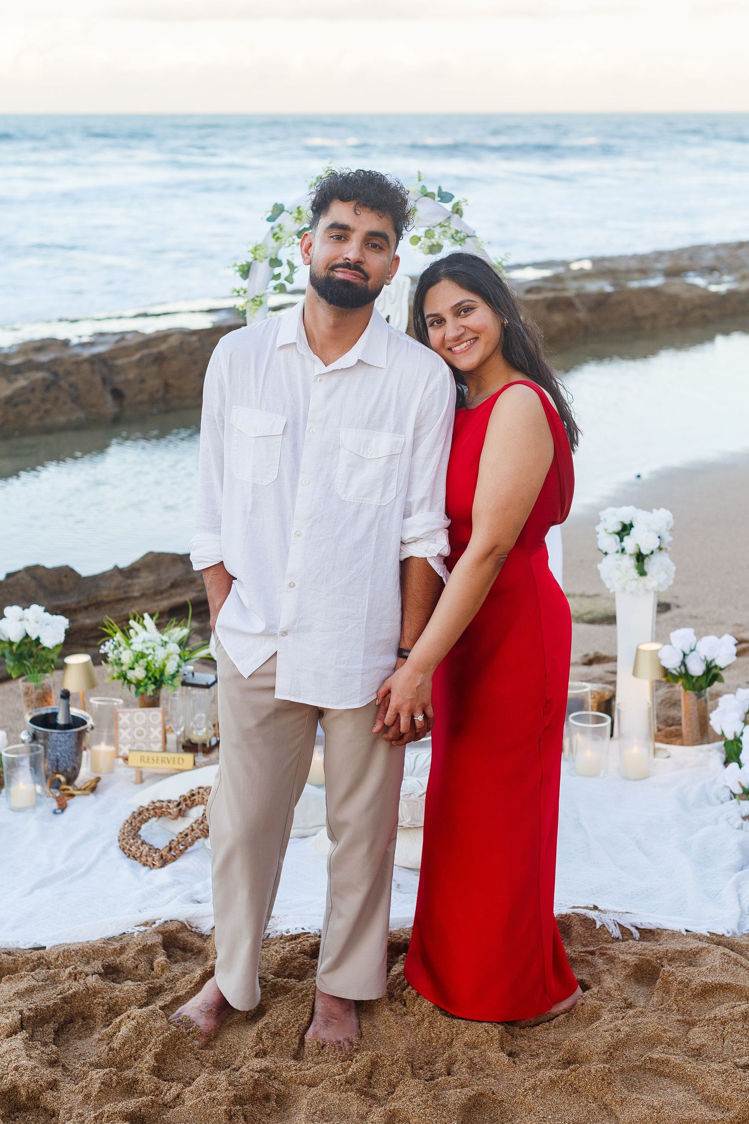 Couples portrait. Proposal and engagement session. Man and woman on the beach. Kikita Surf Beach, Dorado, Puerto Rico.