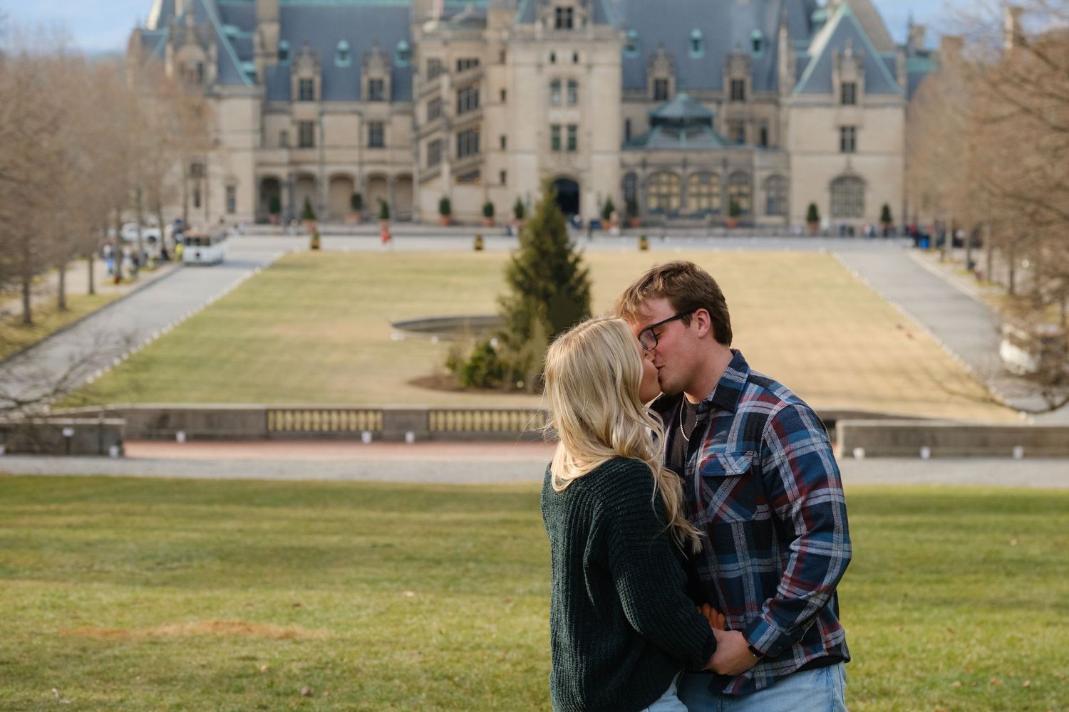 Biltmore proposal photographer capturing engagement on Diana Lawn