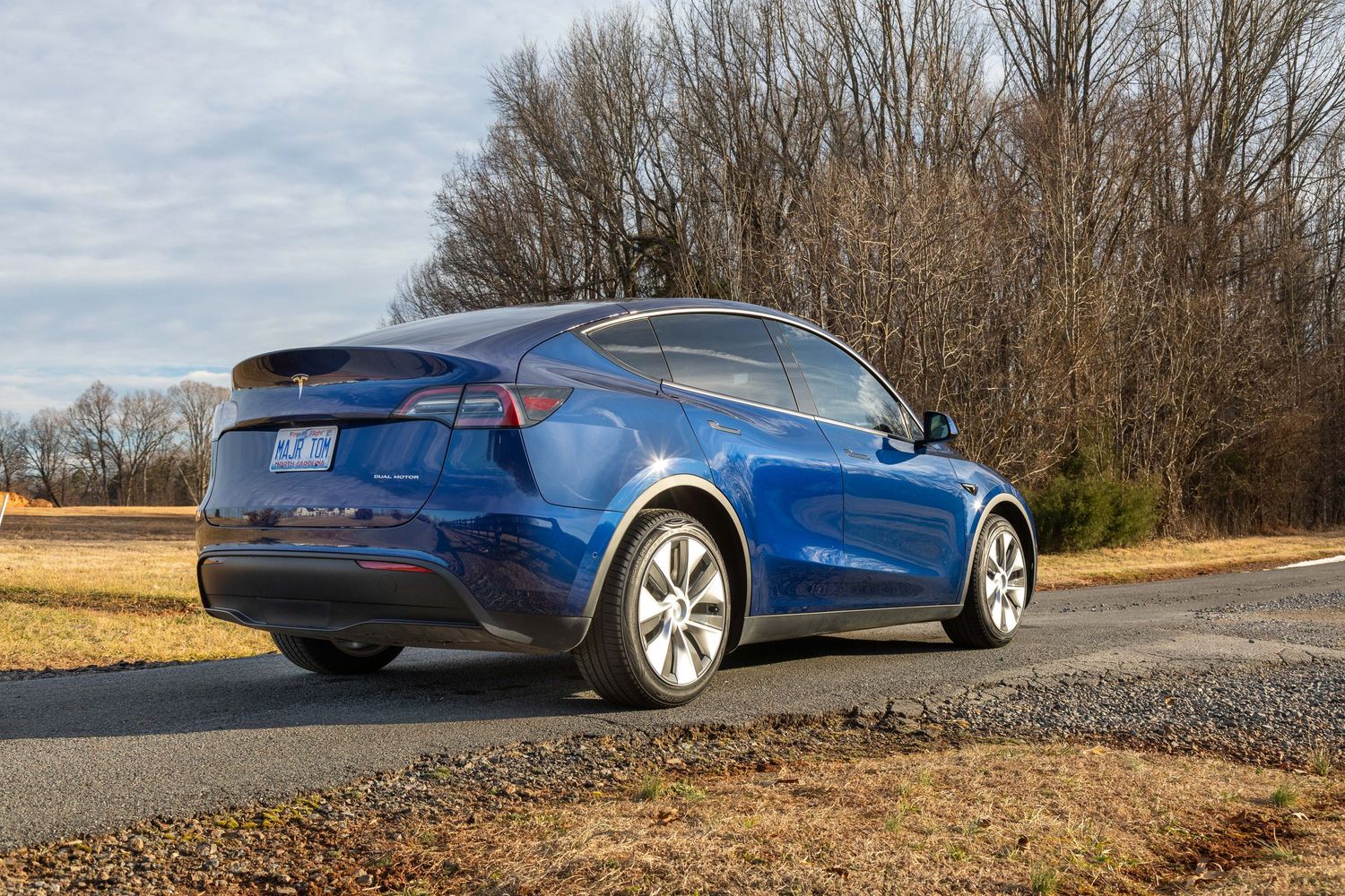 Major Tom Tesla Left Rear Shot with Vredestein Tires prominently displayed