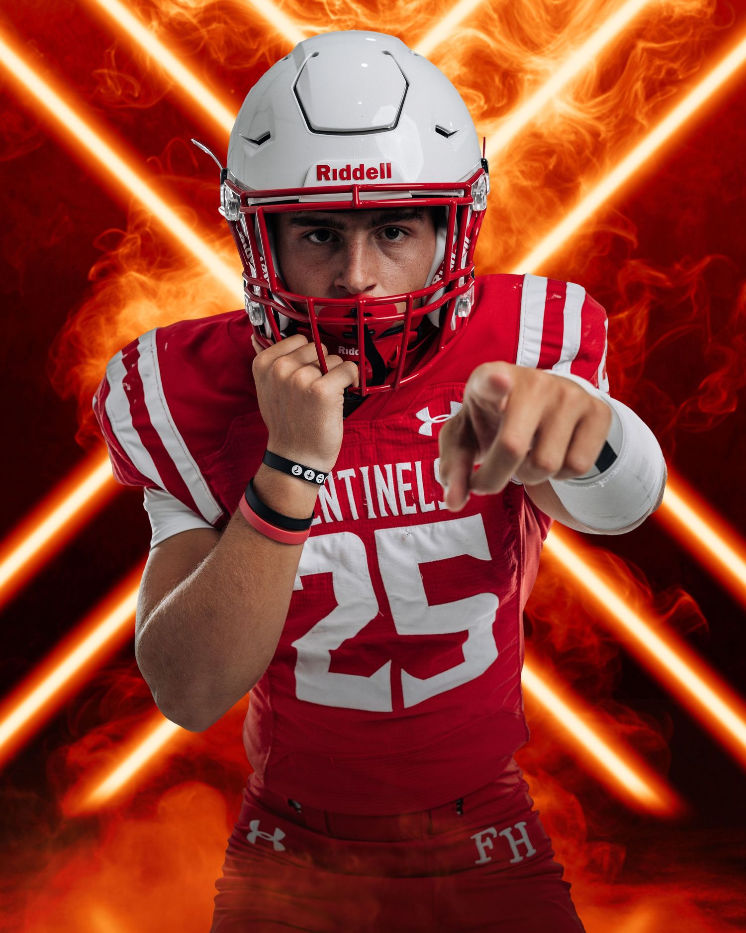 Football player in red and white uniform strikes dramatic pose against fiery orange background with diagonal lines., KMP Sports