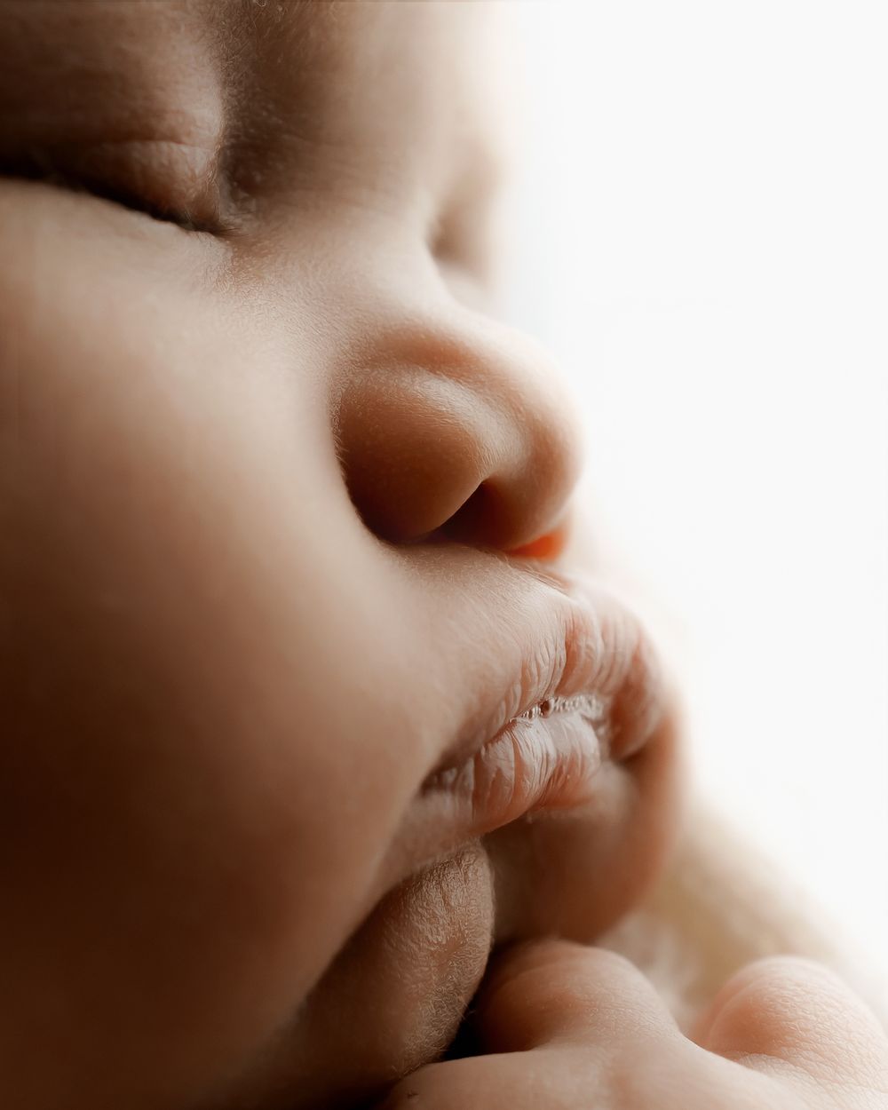 Delicate newborn details preserved through photography
