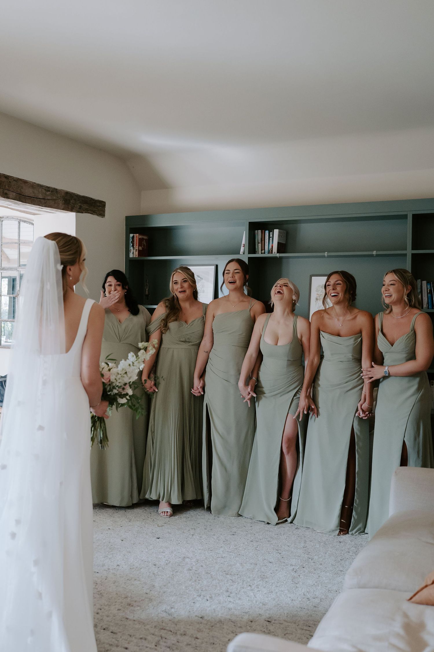bridesmaids emotional first look with bride at ivy lodge in cirencester