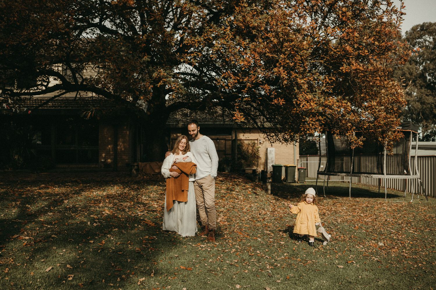 Melbourne family at home in their garden with a newborn and toddler