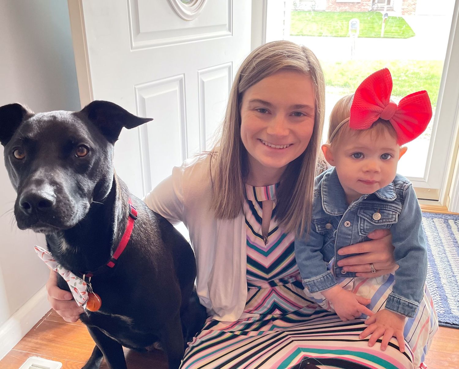 Courtney, Springfield, IL family photographer, shares insight to her life with a picture of her, her daughter and black lab on Easter