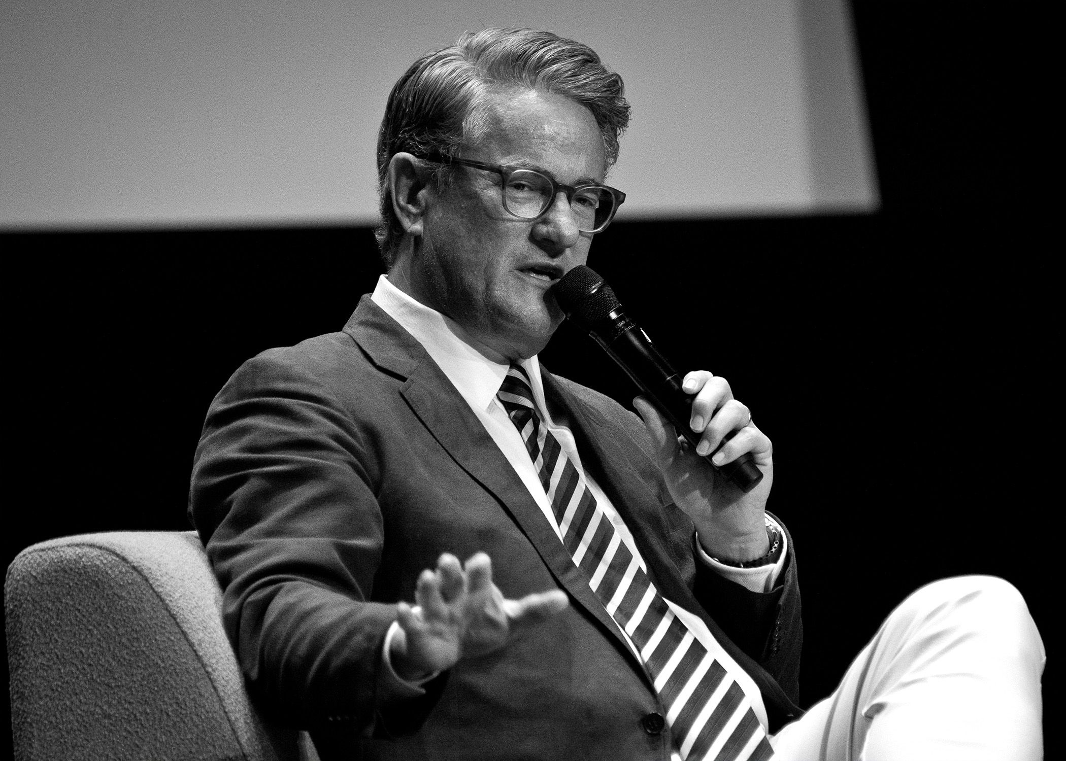 Joe Scarborough speaking on stage Jeffrey Tholl photography
