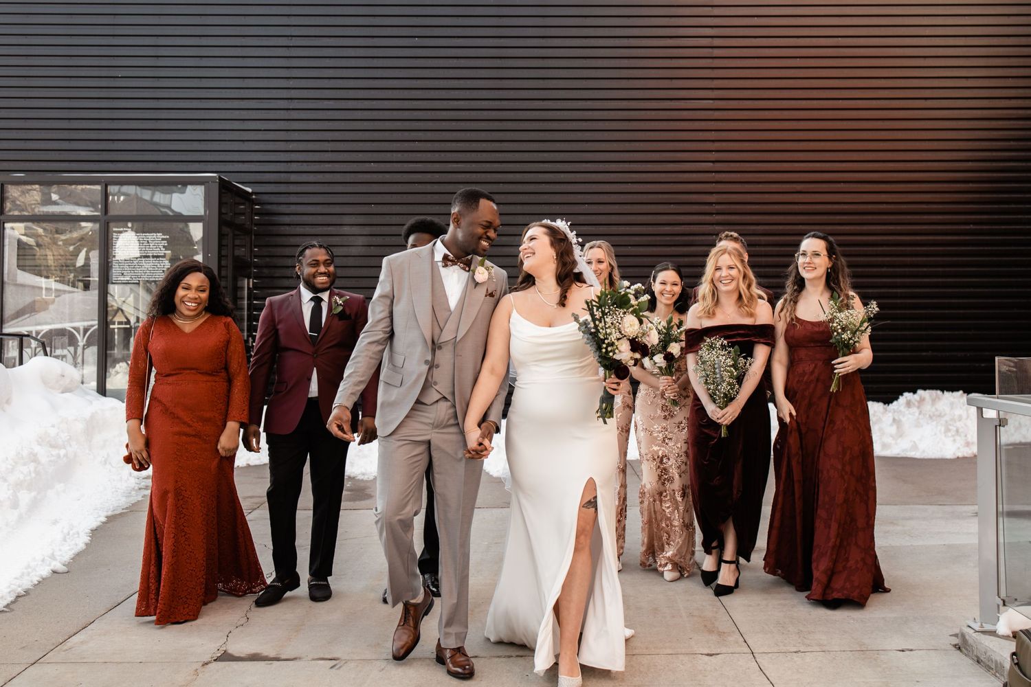 Bride and Groom walking with the bridal party