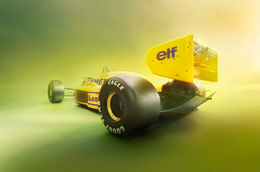 Close-up sequence of a Formula 1 race car tire and wheel in warm golden lighting.