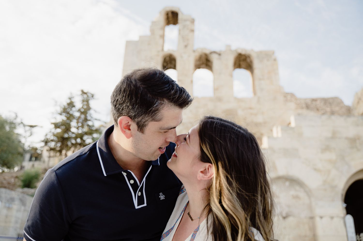 A candid photo of a couple at their engagement photoshoot in Athens Greece