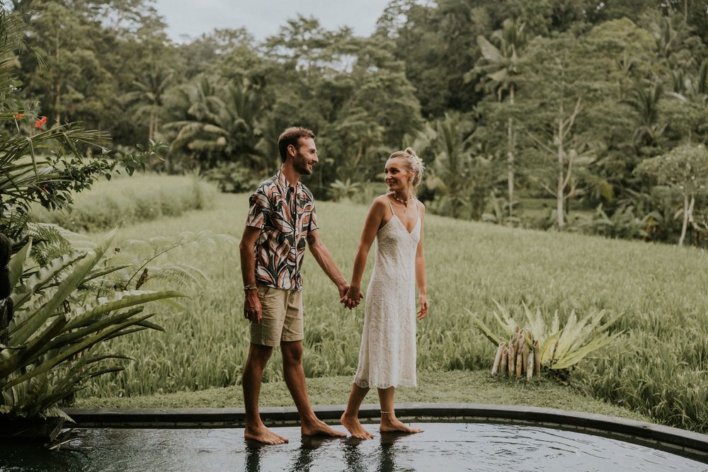 Couple portrait at Bamboo House in Karangasem Bali with tropical green garden