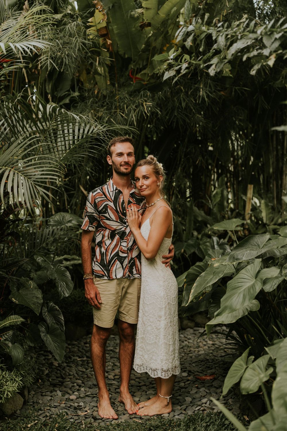 Couple portrait at Bamboo House in Karangasem Bali with tropical green garden