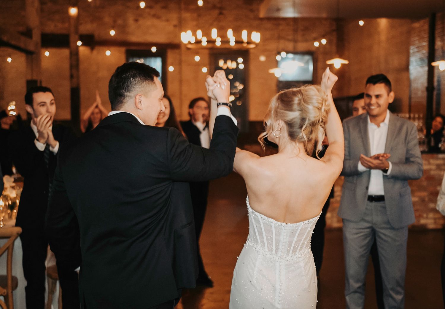 Newlyweds dancing with movement blur for a dreamy, artistic editorial feel.