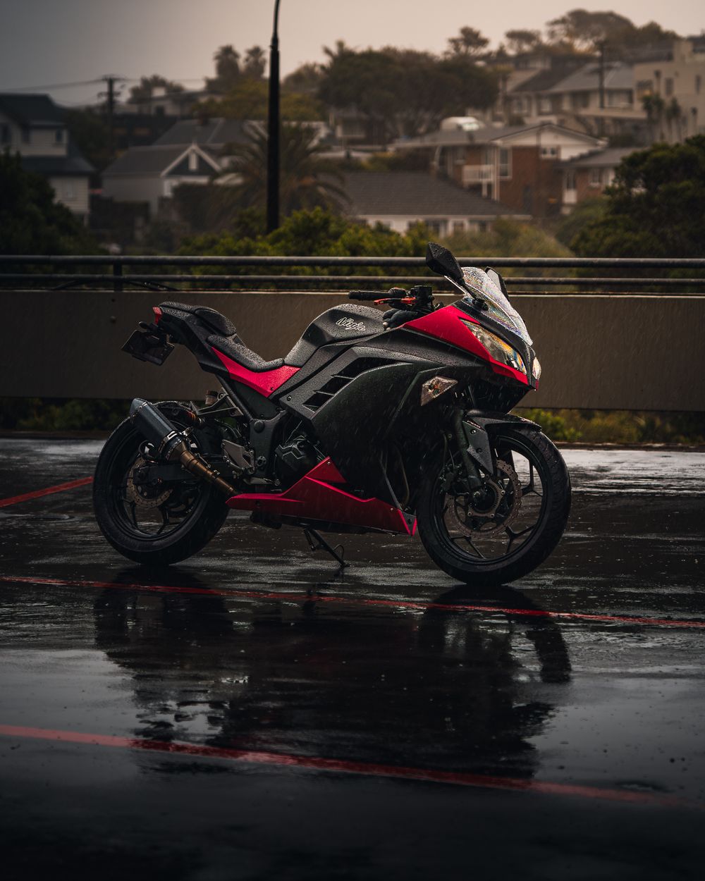Kawasaki Ninja motorcycle photographed in the rain