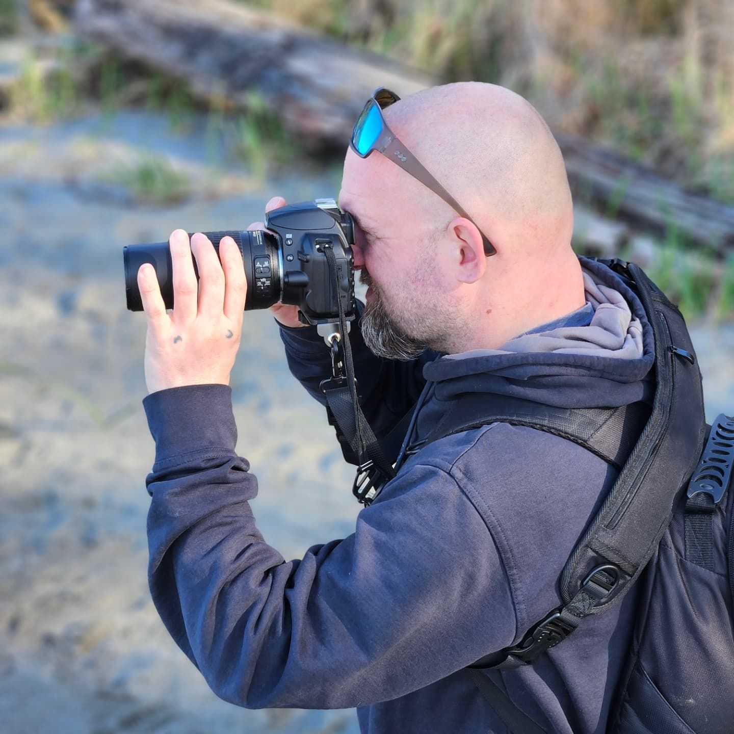 Luv’N’Pics photographer capturing a moment during an outdoor photography session