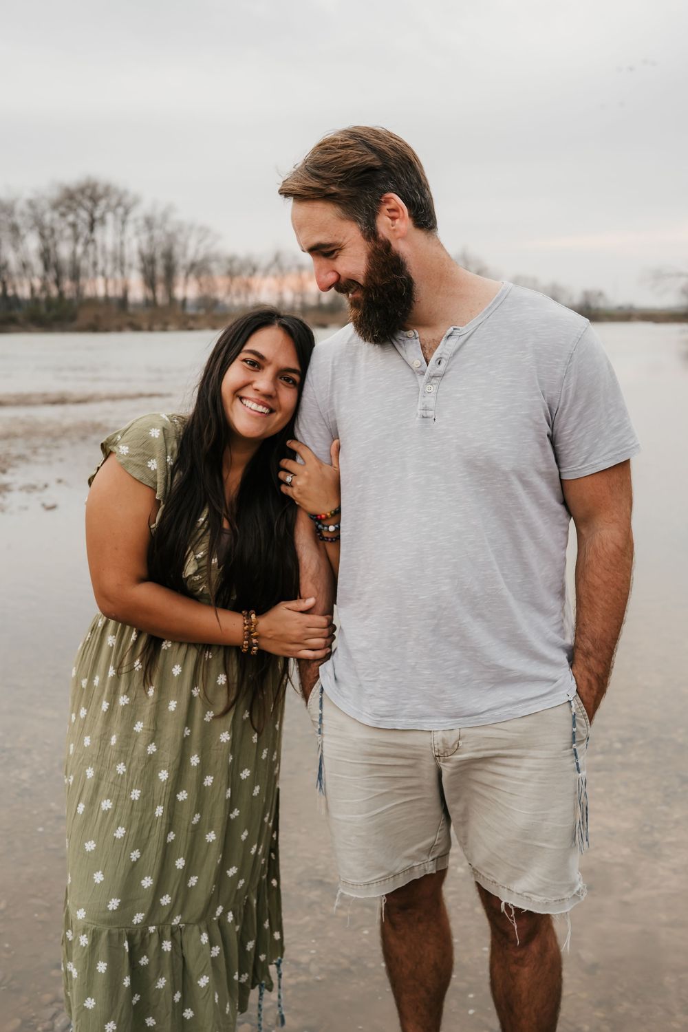 man looks adoringly at his soon to be bride during his engagement session in cincinnati