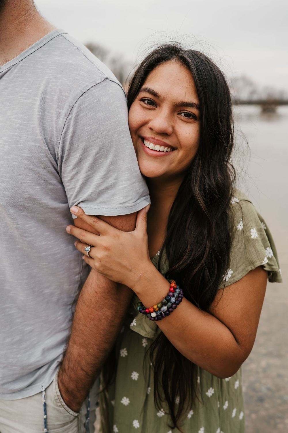 man looks adoringly at his soon to be bride during his engagement session in cincinnati