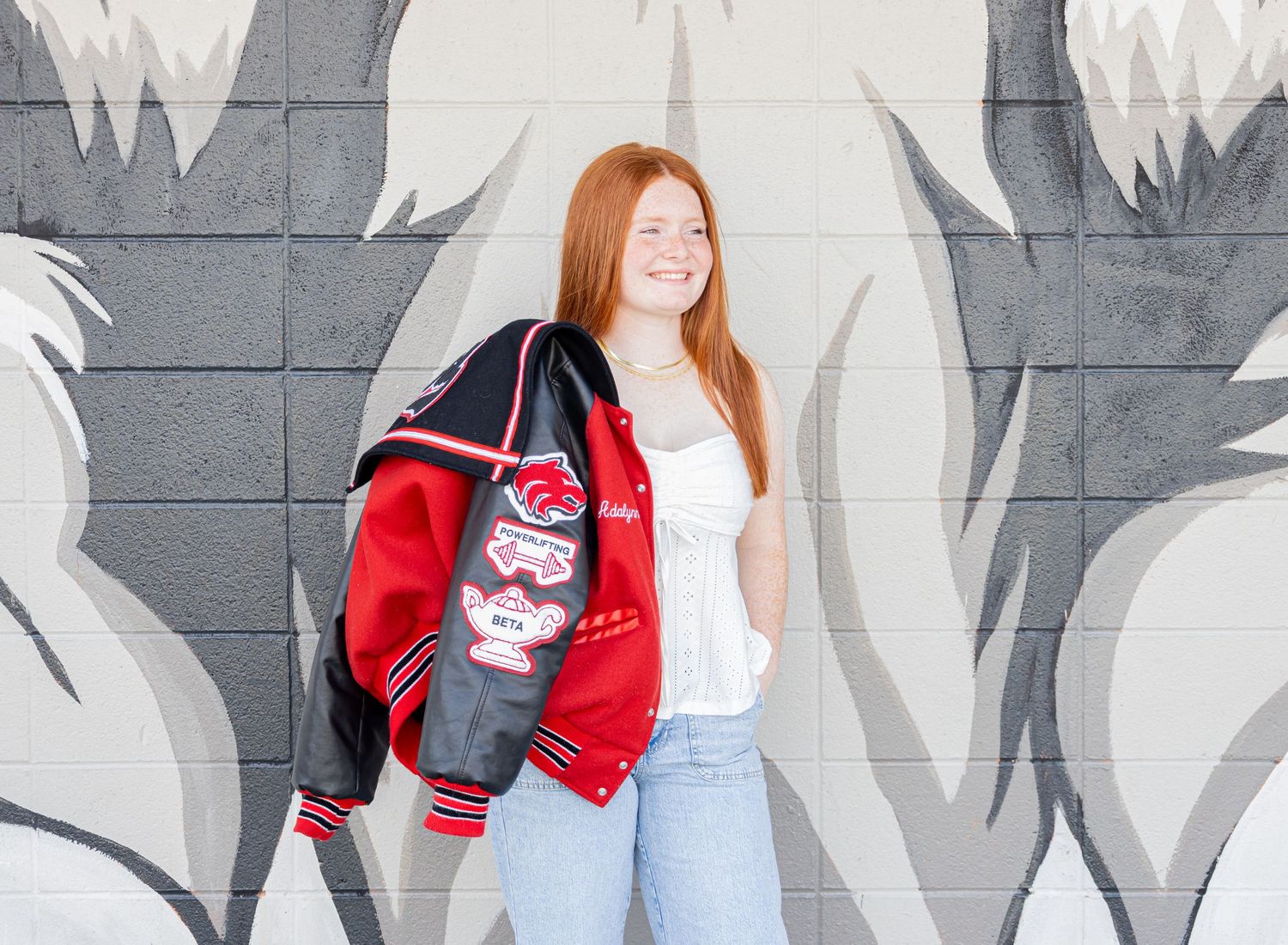 Senior girl with letterman jacket