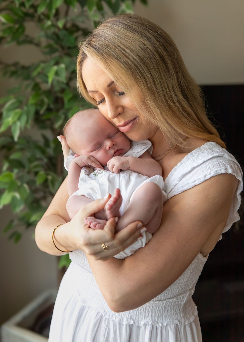 Mother and baby portrait during professional at-home natural newborn photography session