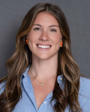 Real estate agent headshot taken in Charleston SC with clean studio background