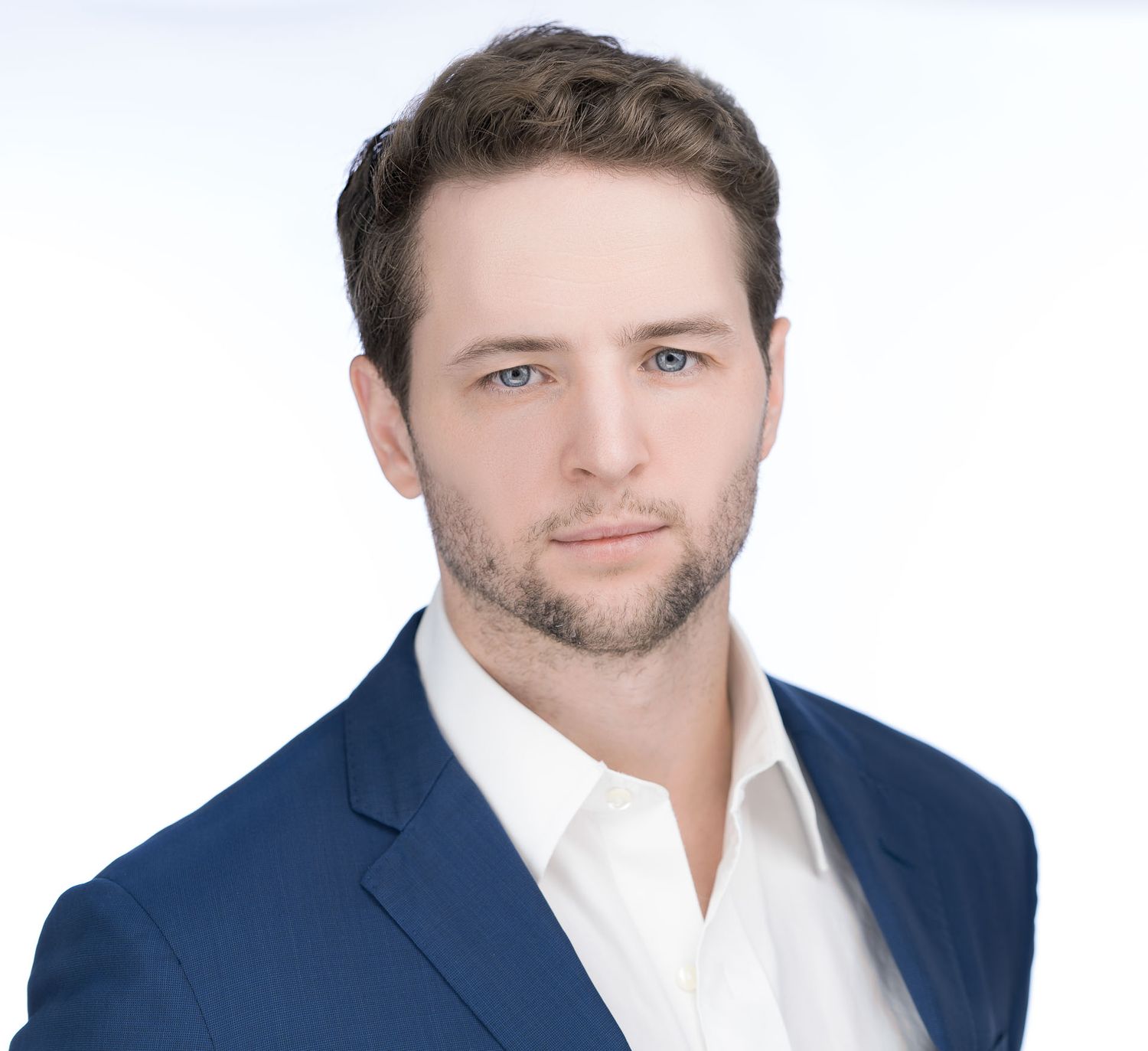 White background corporate headshot of Charleston SC business executive