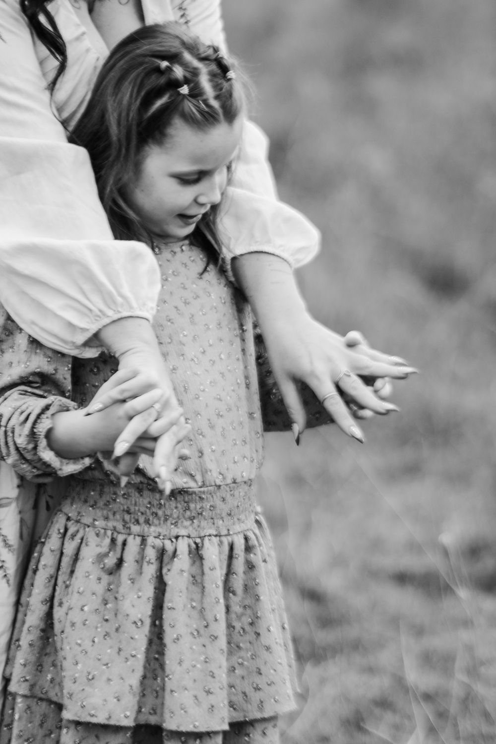Close-up shots of a floral vintage dress with delicate details and ruffles.