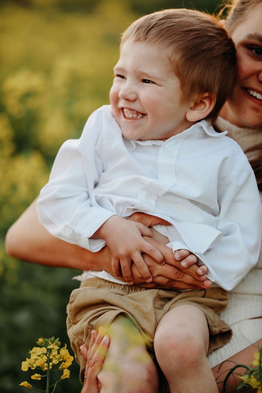 Series of candid moments showing playful interaction in blooming field.