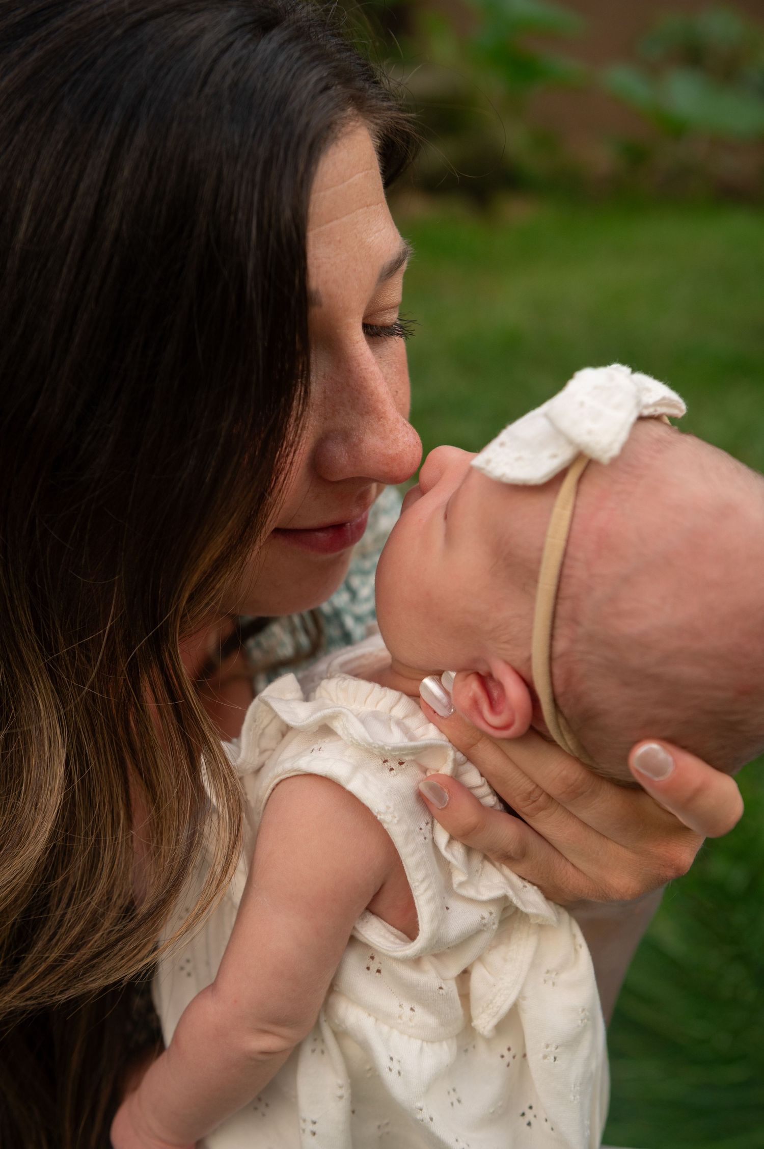 newborn snuggles from a beautiful mama