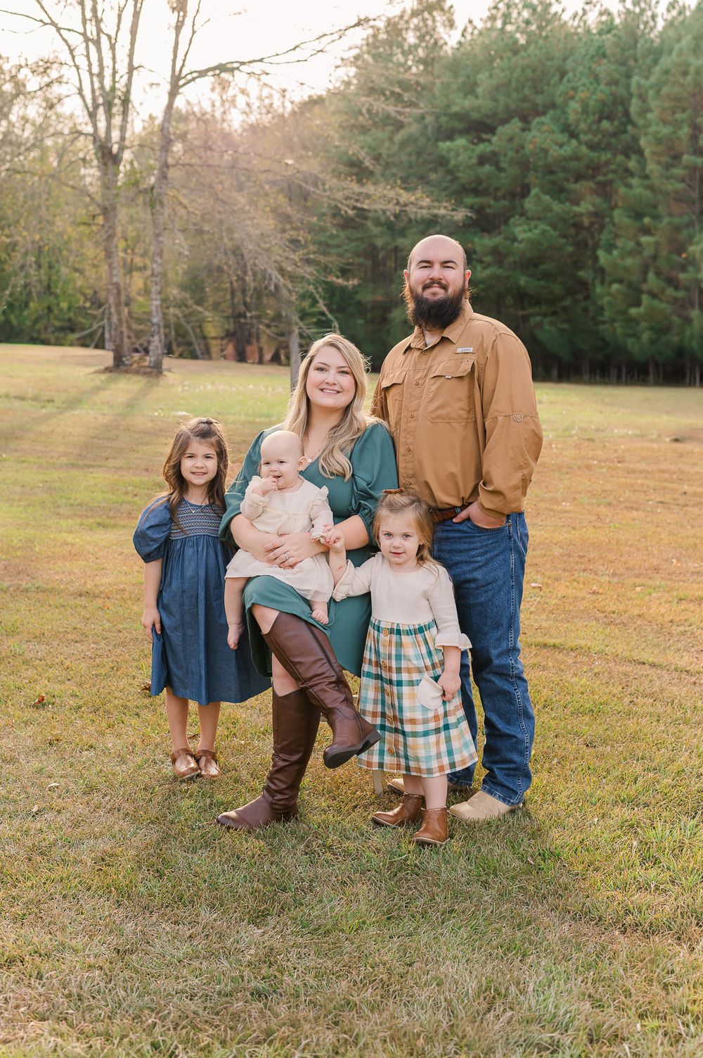 Family of five posing in a field, Sharpsburg, GA