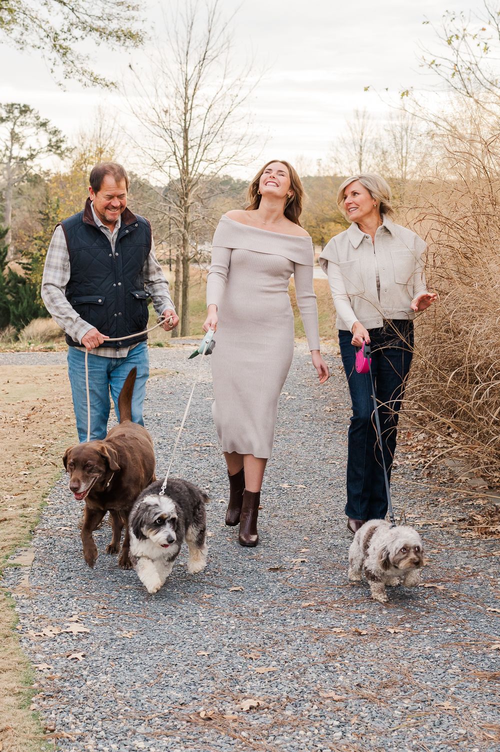 Family of three walking three dogs, Fayetteville, GA