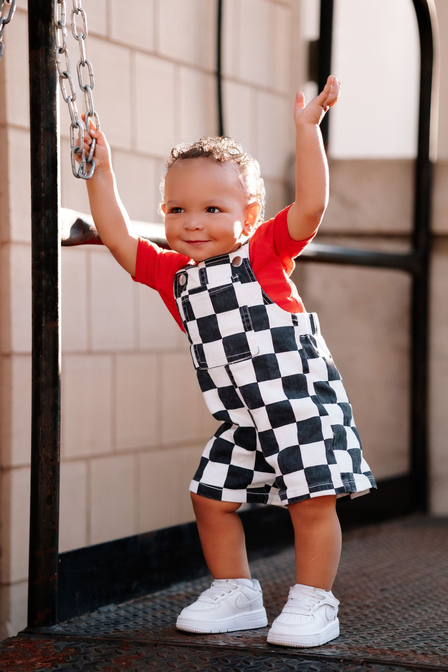 Conway Family photos in Little Rock, Arkansas- 1 year old jamming out in urban setting
