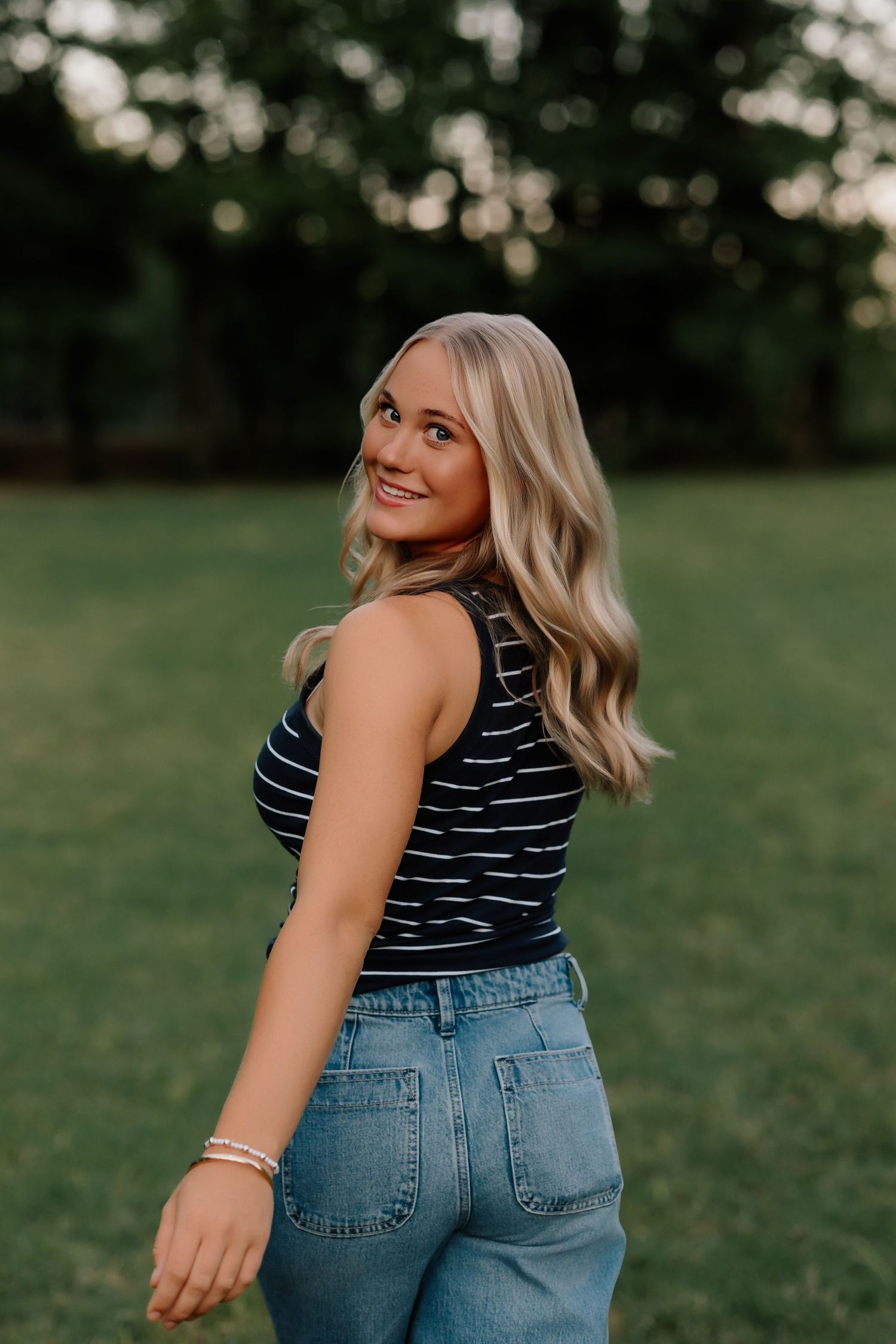 Lonoke Family Photos in Lonoke County, Arkansas- girl walking away playfully