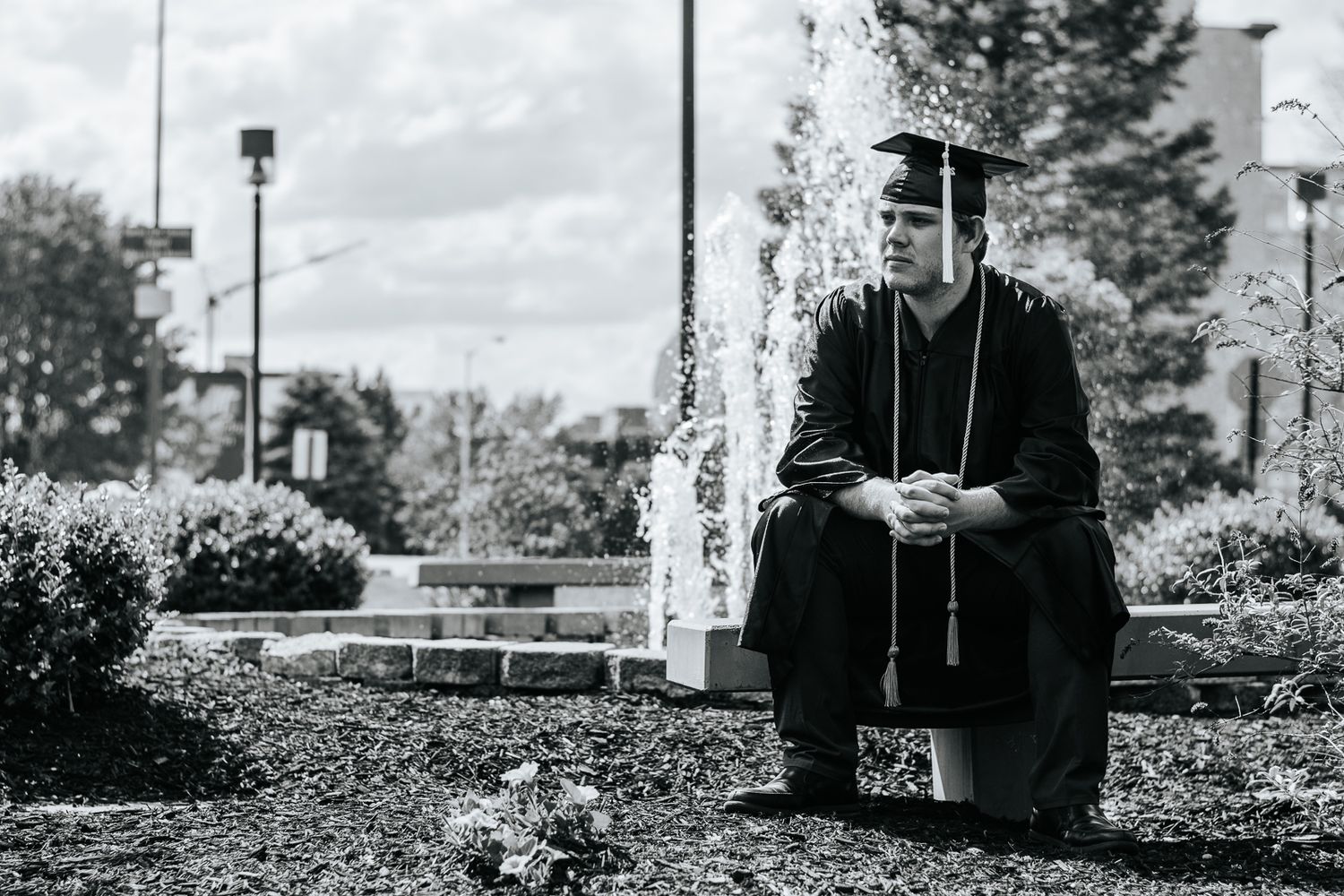 College graduation, cap and gown, black and white