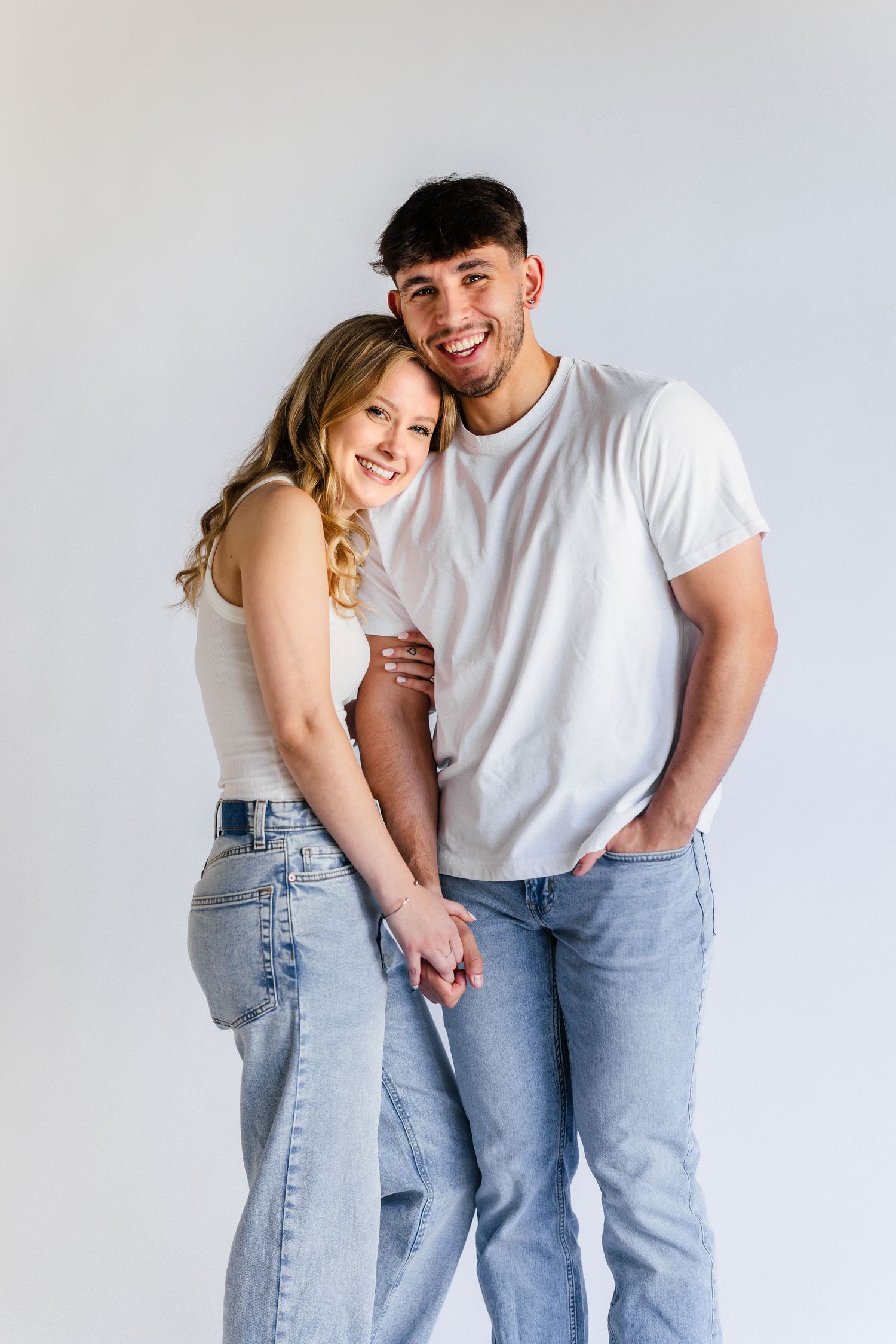 Engagement session with simple white backdrop in my downtown Zionsville, indiana studio