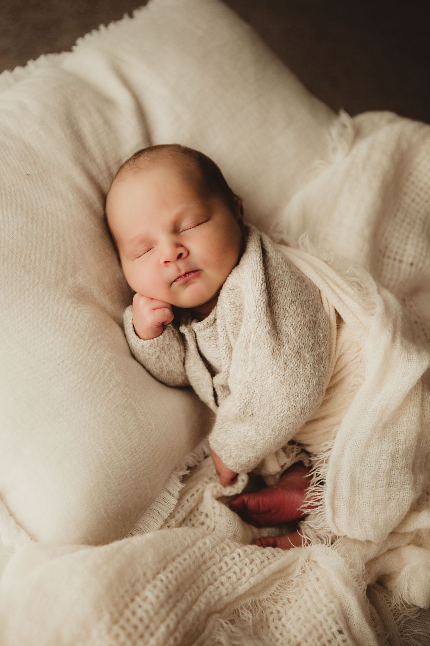 Sleeping newborn baby in Bunny Bird and Bear Studio Tinonee