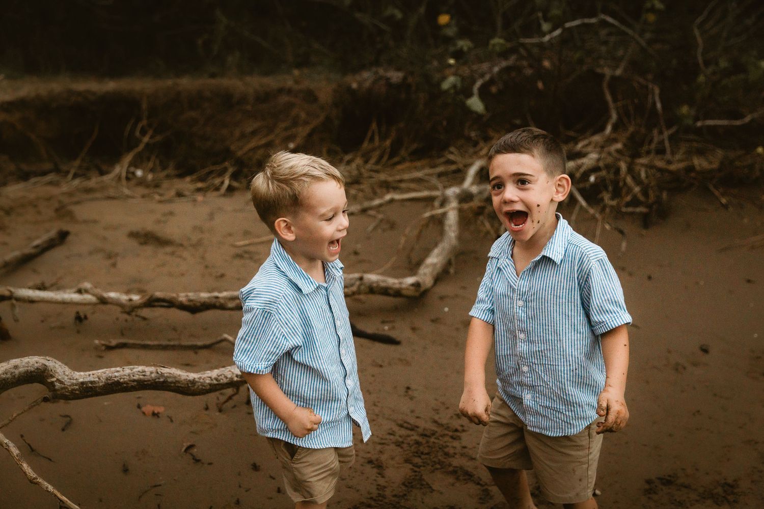 Family walking hand-in-hand in natural location during Brisbane family photo shoot