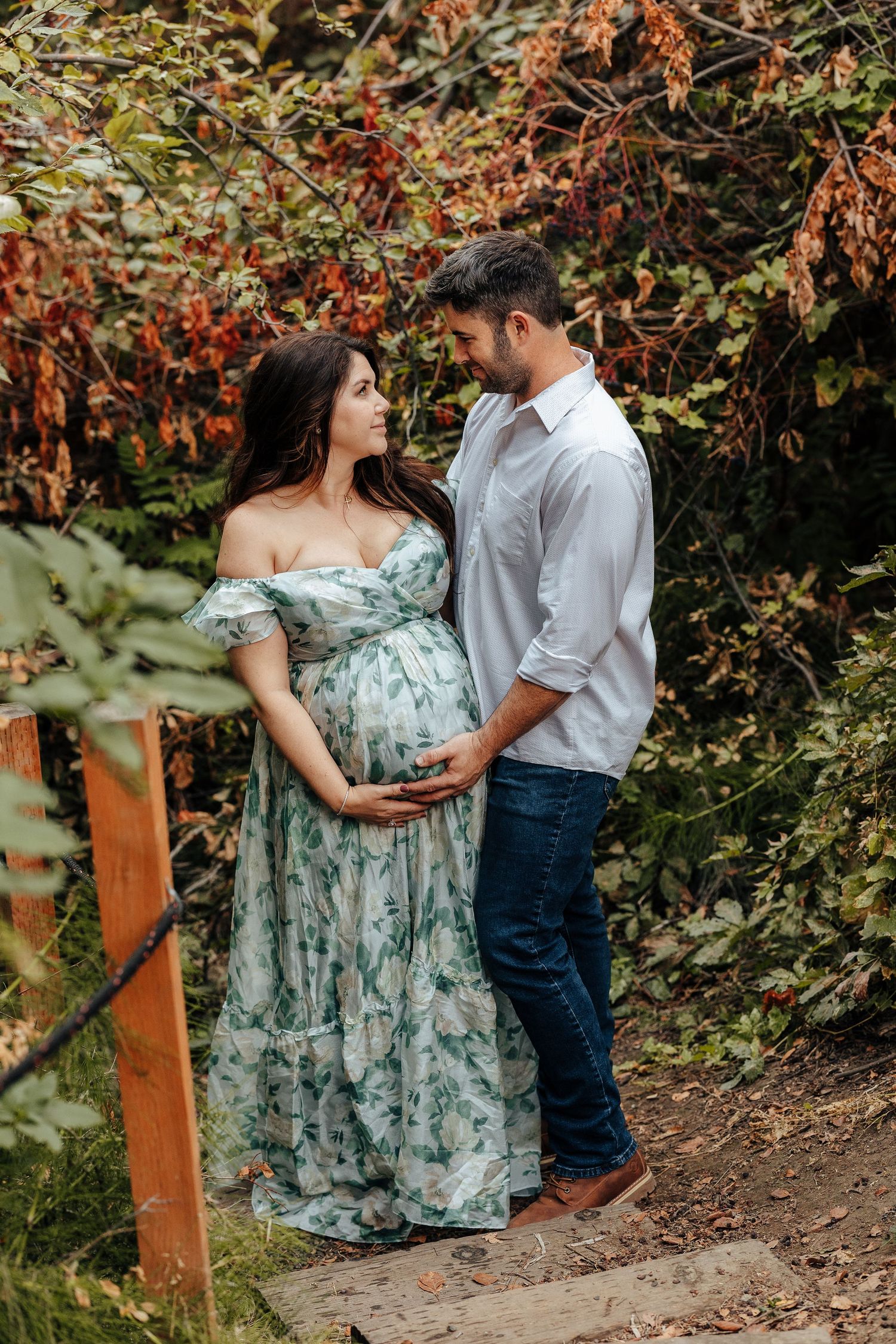 Maternity photos of the mom to be and the husband holding her belly at Arthur G. Rempel trail in Walla Walla Washington