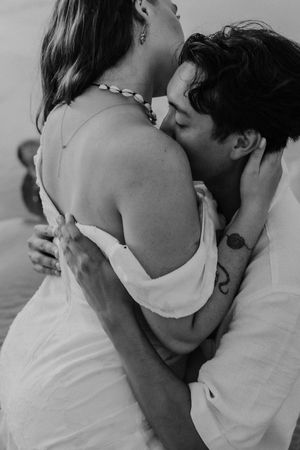 A series of intimate black and white romantic photographs showing tender moments between two people.