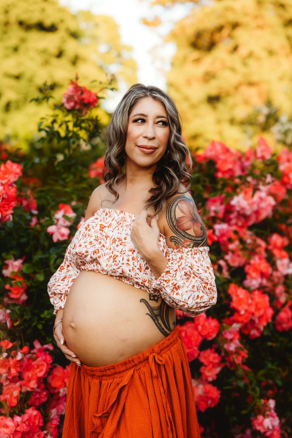 Maternity session at a rose garden at Point Defiance Park in Tacoma Washington